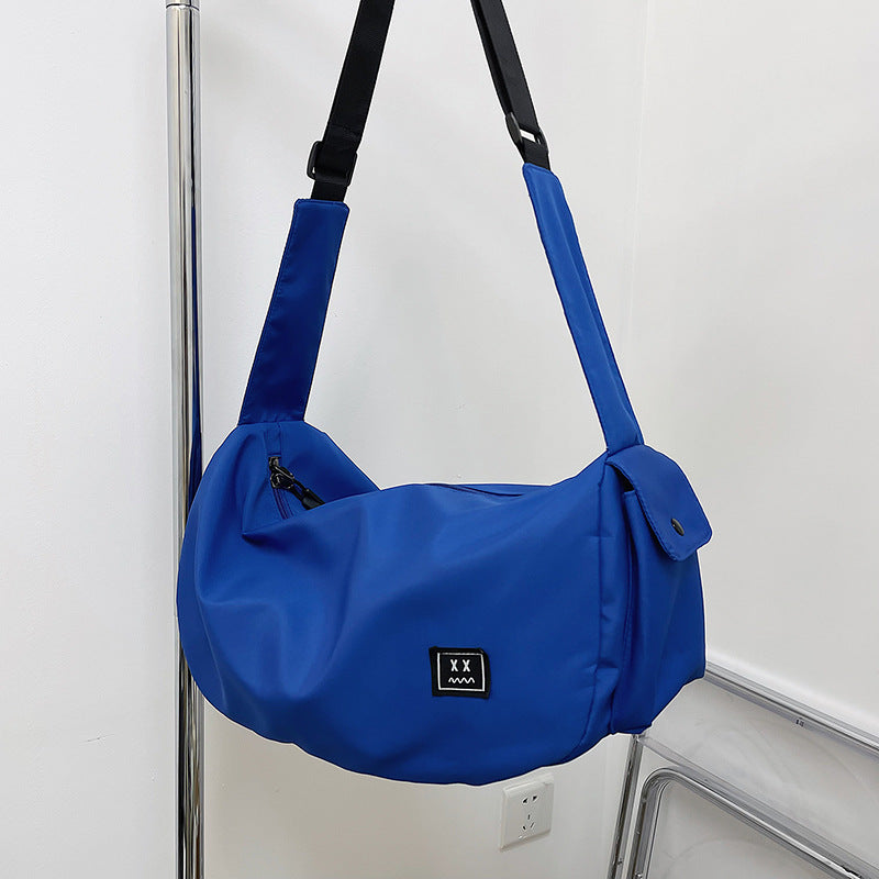 Sporty shoulder bag with adjustable carrying strap Bowlift