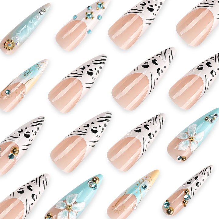 Artistic stiletto nails with floral accents and glitter details Bowlift