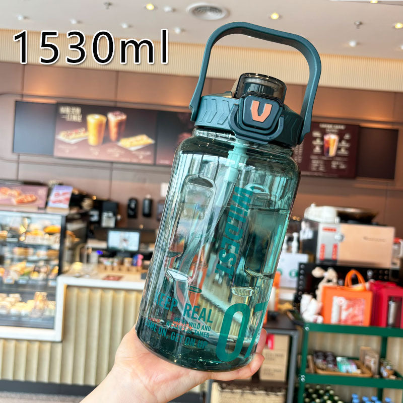 Women’s large water bottle with integrated straw and carrying handle Bowlift