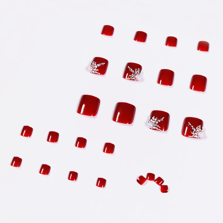 Artful toenail design with elegant rhinestone design Bowlift