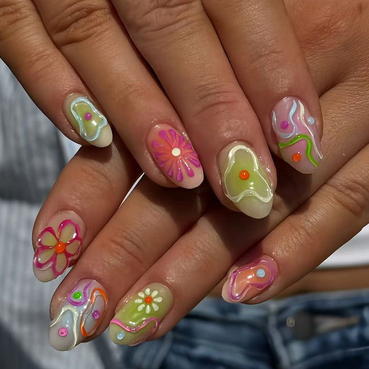 Artificial nails in the creative flower and foil design Bowlift