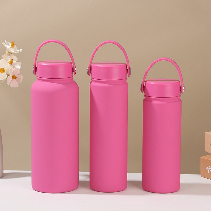 Women's insulated water bottle with ergonomic carrying handle Bowlift