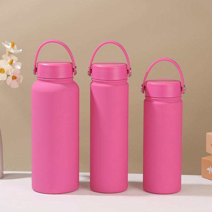 Women's insulated water bottle with ergonomic carrying handle Bowlift