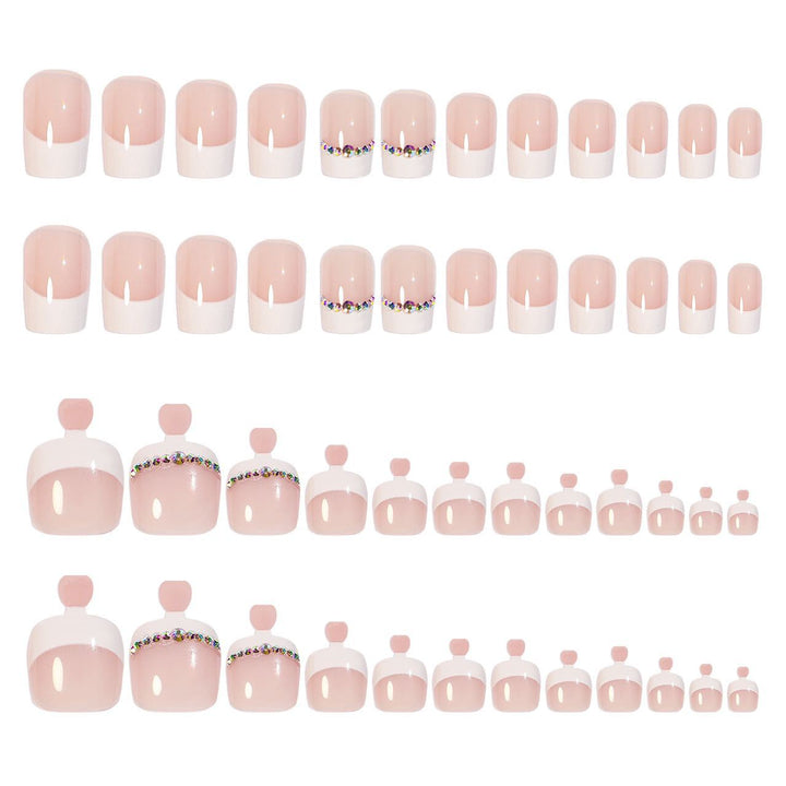 Acrylic nail set with elegant French design and rhinestone embellishments Bowlift