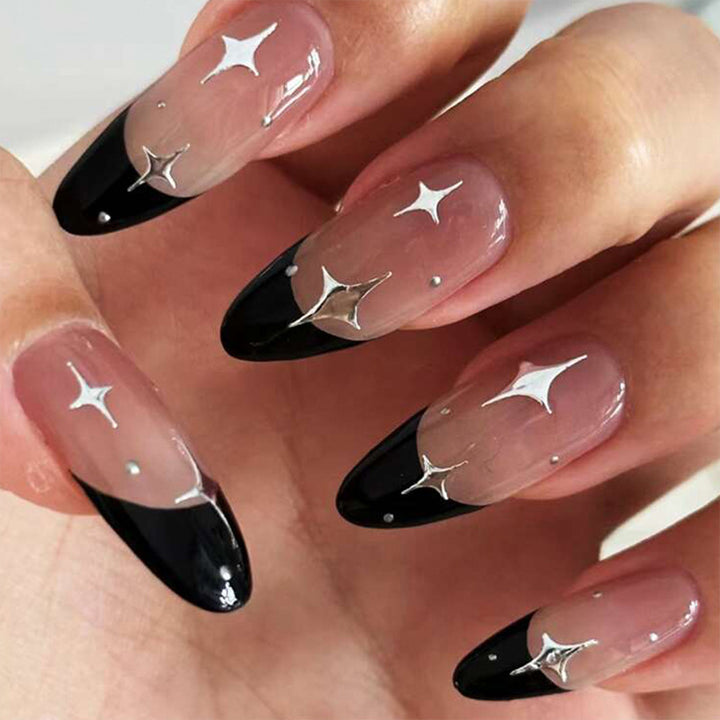Artful stiletto nails with heart-shaped accents Bowlift