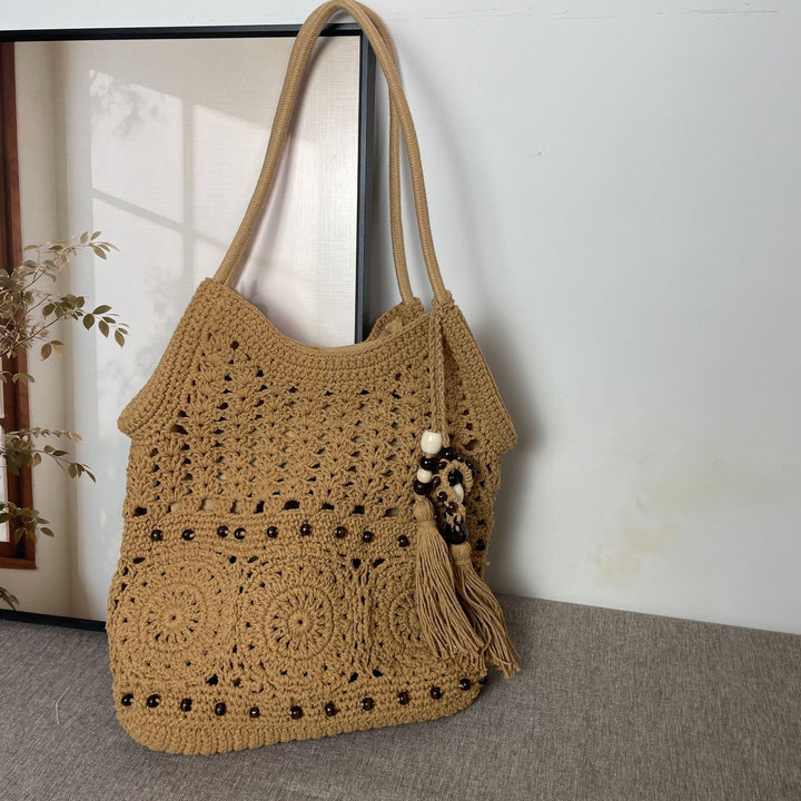 Hand-crocheted shoulder bag with unique fringe design Bowlift