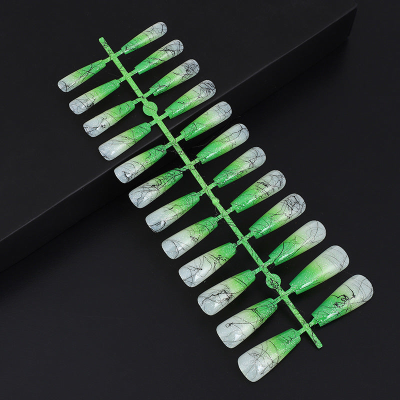 Artificial nails in modern ombre design with marbled accents Bowlift