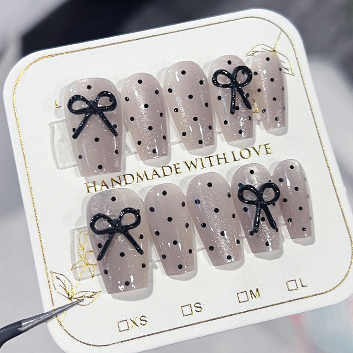 Artful Nail Extensions with Bow Pattern Bowlift