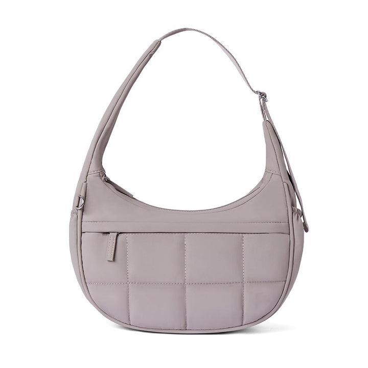 Fashionable shoulder bag with quilted surface Bowlift