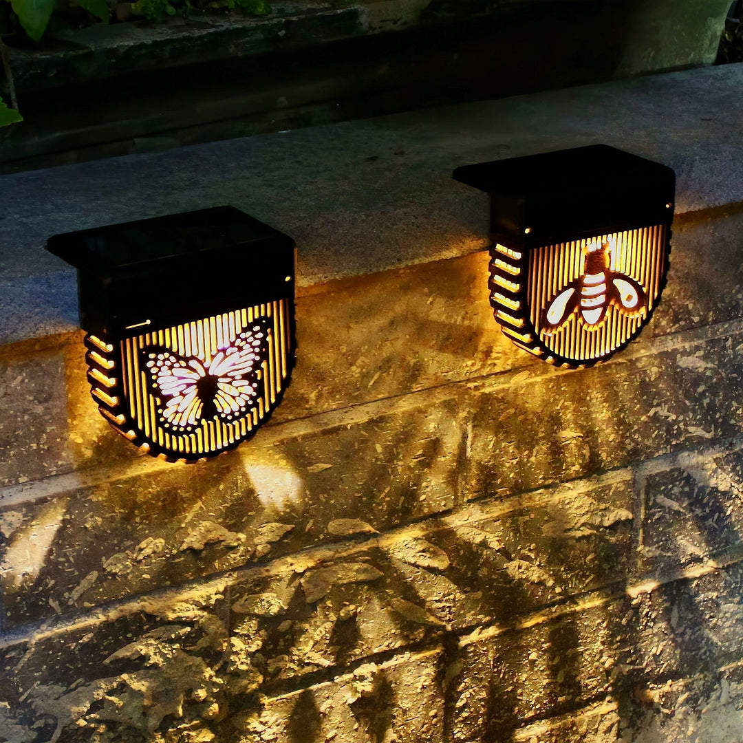 Decorative Solar-Powered Outdoor Wall Lanterns With Laser-Cut Insect And Floral Panels And Warm LED Ambiance Bowlift