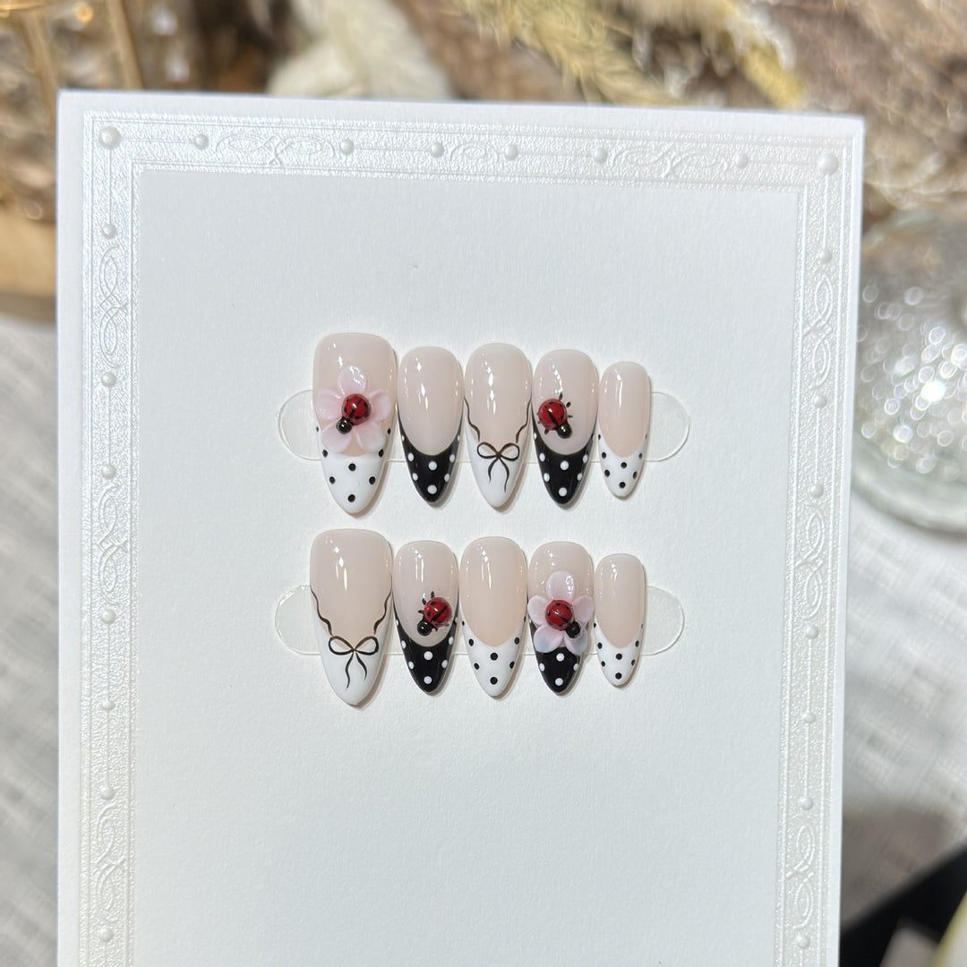 Artistic Stiletto Press-On Nail Set with Floral and Insect Designs Bowlift