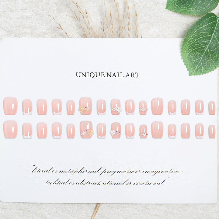 Nail set with elegant flower appliqués and exquisite glitter embellishments Bowlift