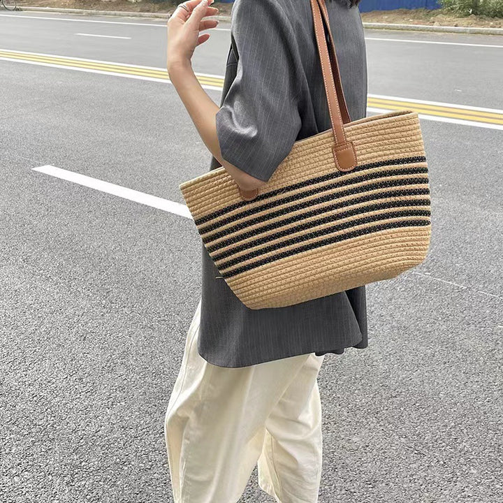 Elegant Tote Bag Made of Woven Bast Material with Robust Leather Accents Bowlift