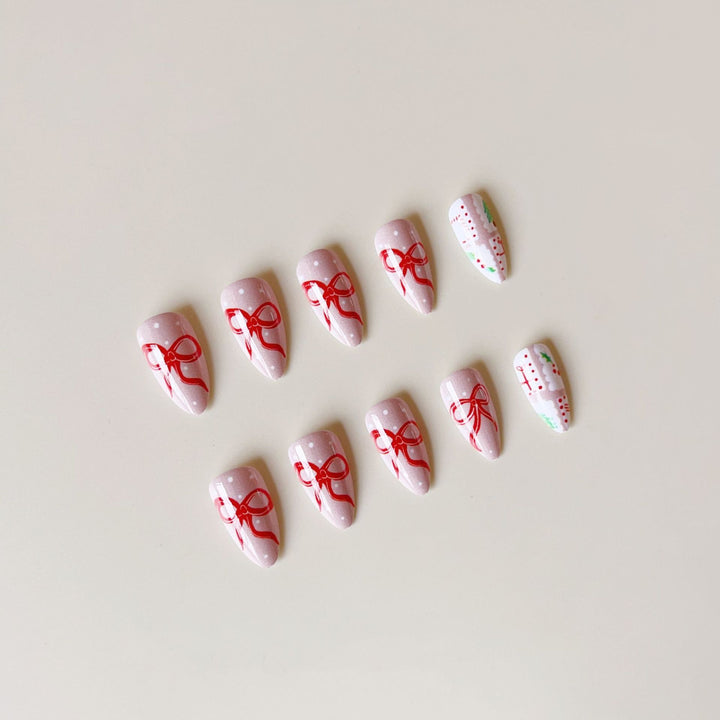 Artificial nail set with festive gift and bow motifs Bowlift