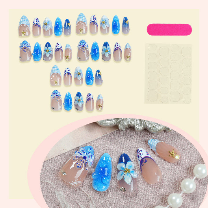 Artificial nail set with maritime motifs and floral design Bowlift