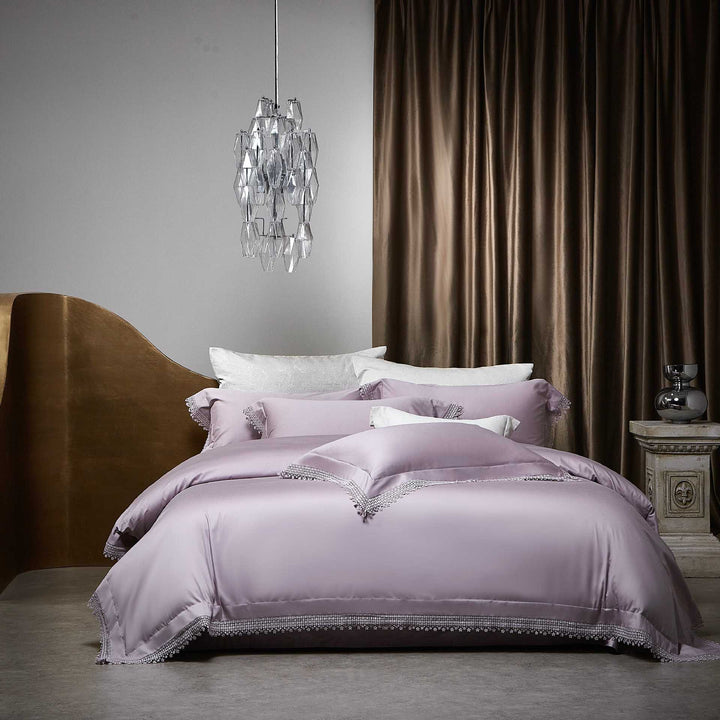 Romantic satin bedding set with delicate lace border and decorative pillowcases