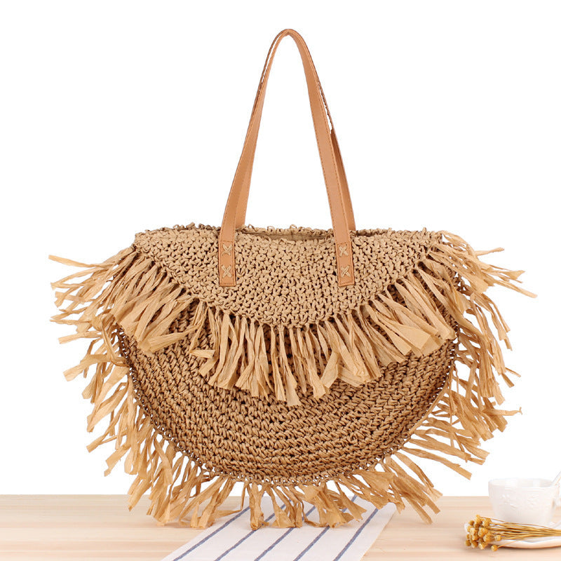 Bast crossbody bag with fringed design Bowlift