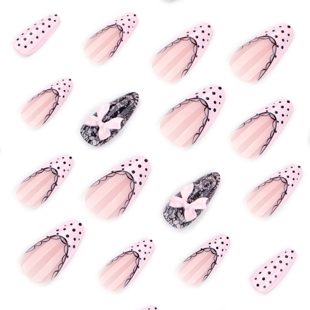 Elegant and artistic stiletto nails with tips and bows Bowlift