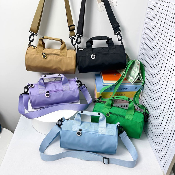 Sporty Mini-Duffel Bag with Adjustable Shoulder Strap and Sturdy Carry Handles Bowlift