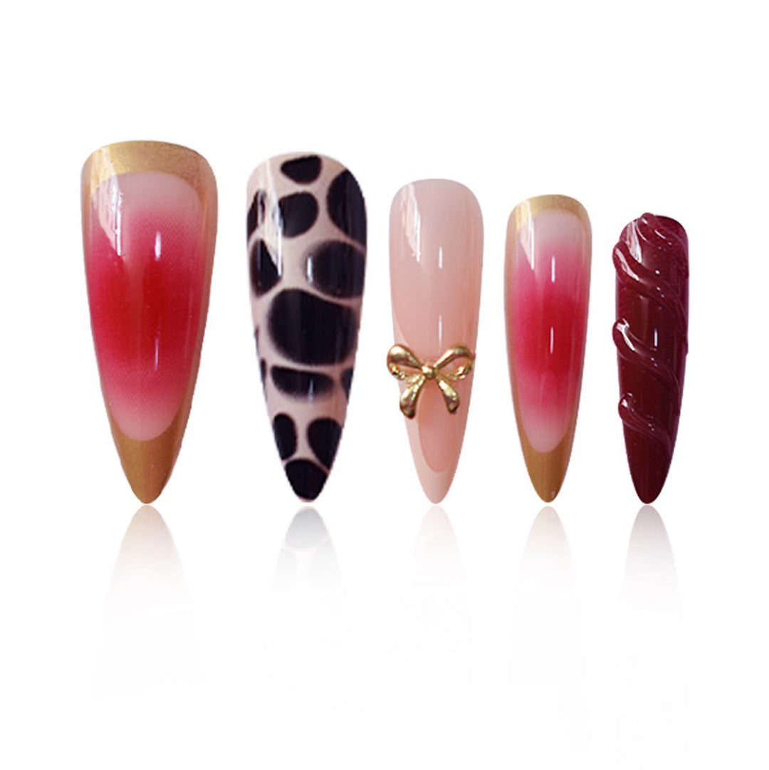 Artistic Stiletto Press-On Nail Set with Unique Accents Bowlift