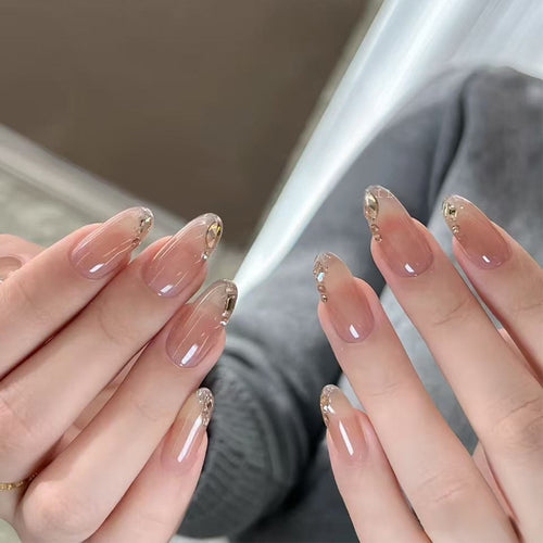 Artistic Luxe Press-On Nails with Elegant Gold Accents Bowlift