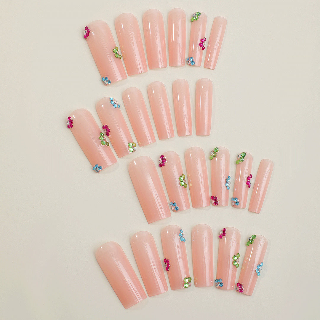Artificial nail tips with colorful flower accents Bowlift