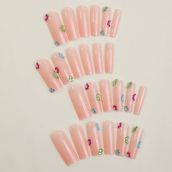 Artificial nail tips with colorful flower accents Bowlift