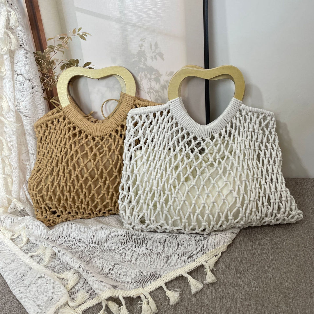 Stylish handbag with heart-shaped handle Bowlift