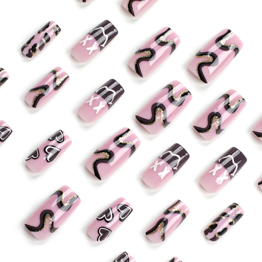 Artful nail extensions in elegant design with gold accents Bowlift
