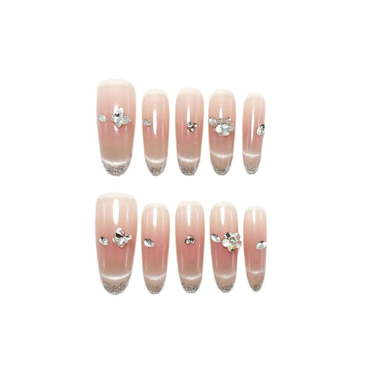 Glamorous artificial nails with rhinestone decorations Bowlift