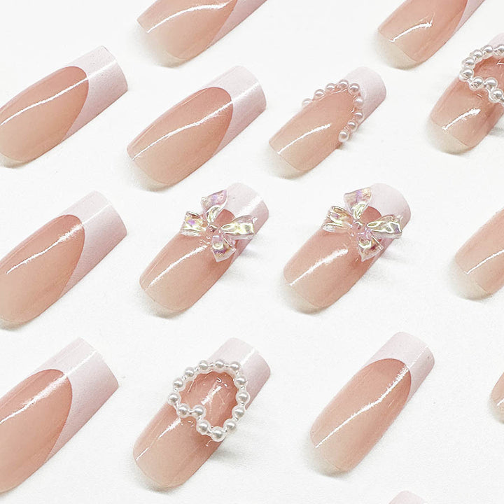 Acrylic nail set with elegant pearl and 3D flower decorations Bowlift