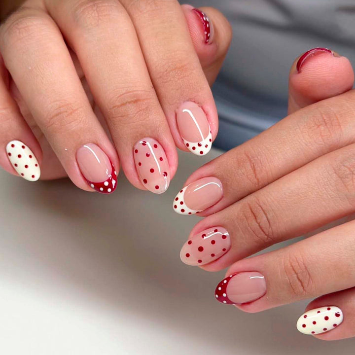 Artful stiletto nails with cute dots and accentuated color gradients Bowlift