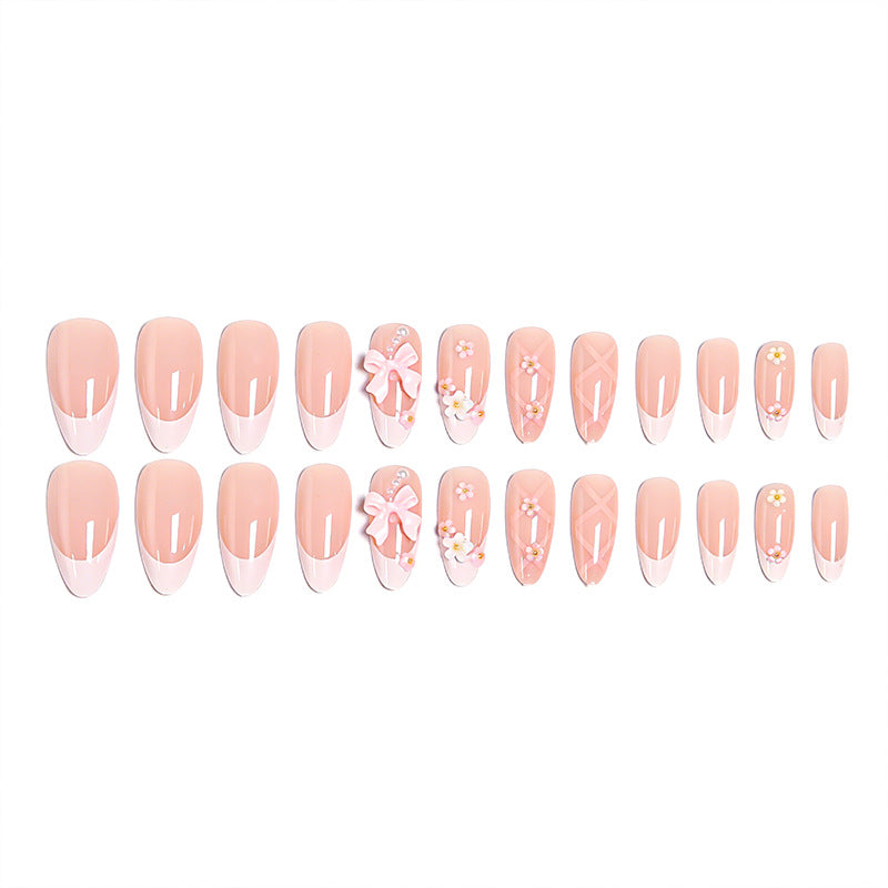 Artful Nail Tips with Ribbons and Floral Decorations Bowlift