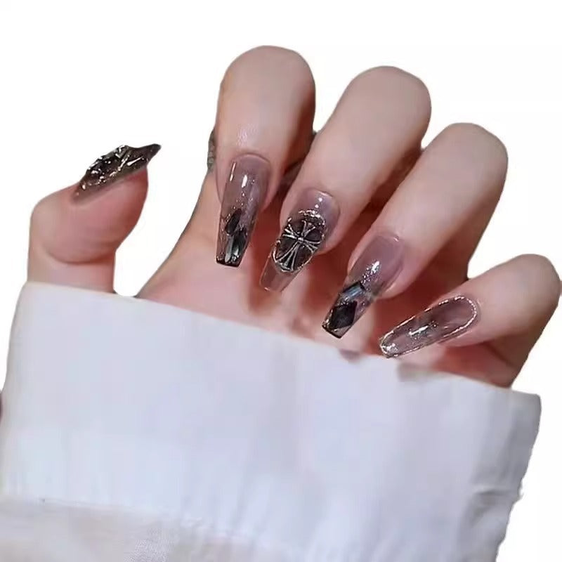 Glamorous artificial nails with heart design and glittering accents Bowlift