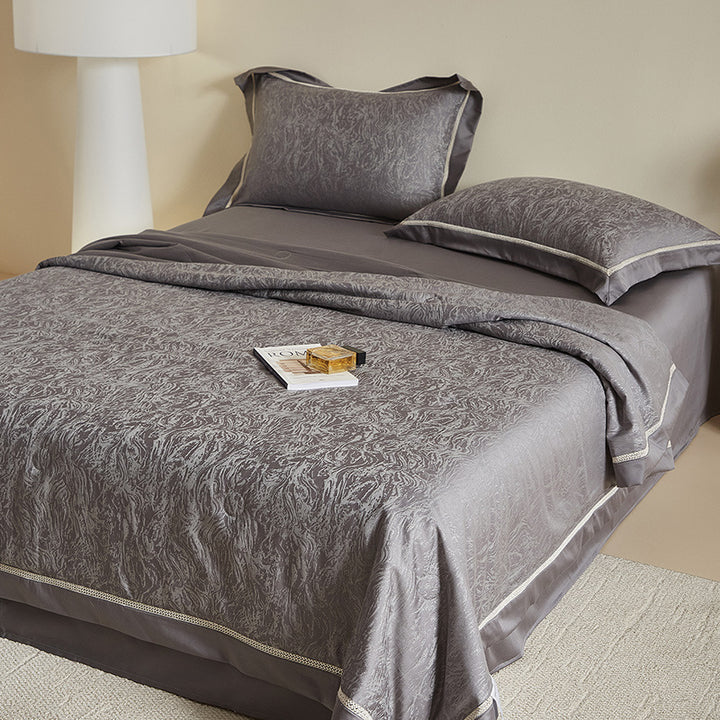 Luxurious jacquard bedding set with fitted sheet and decorative stitching
