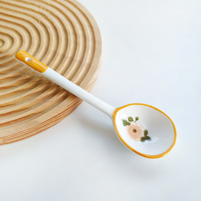 Ceramic soup spoon with lucky cat illustration and ergonomic long-handle Bowlift
