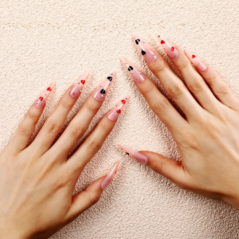Glamorous artificial nails with heart accents Bowlift