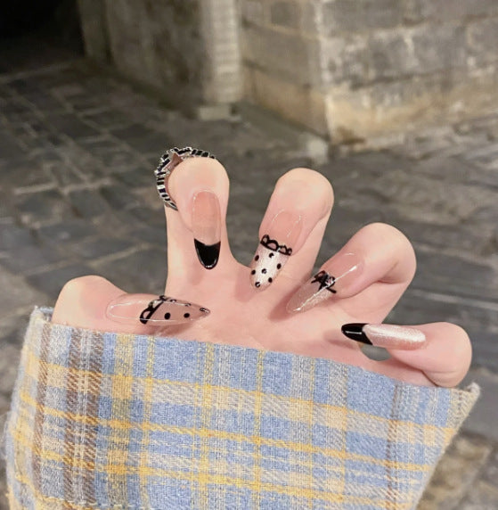 Artistic Press-On Nail Set with Unique Designs Bowlift