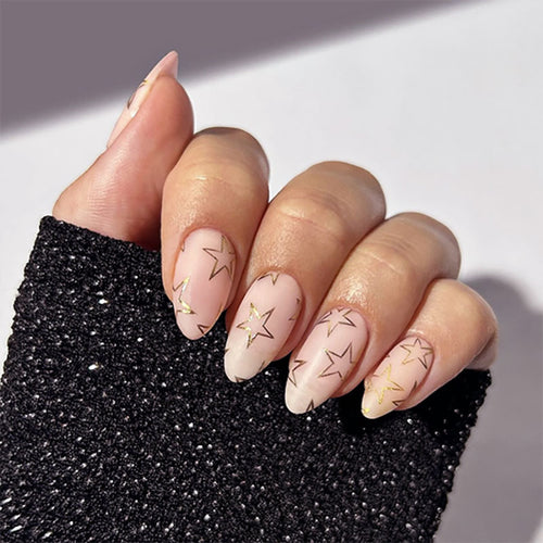 Artful Nail Art with Golden Star Motifs Bowlift
