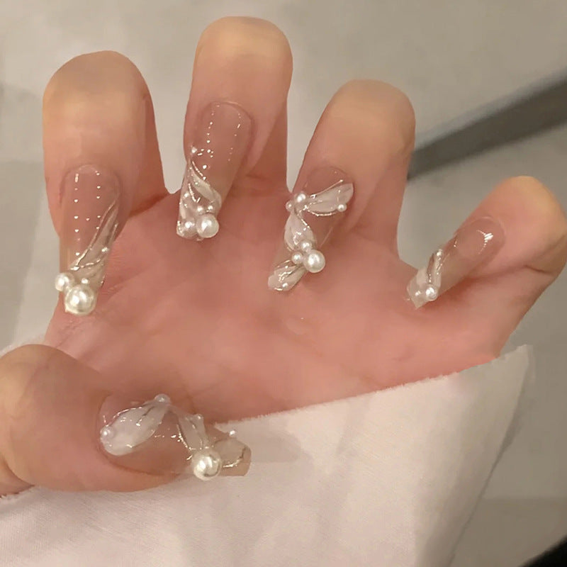 Artful Nail Art with Glitter and Butterfly Elements Bowlift