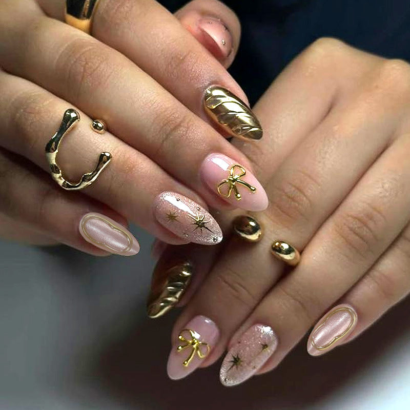 Artificial nail set with elegant golden accents Bowlift