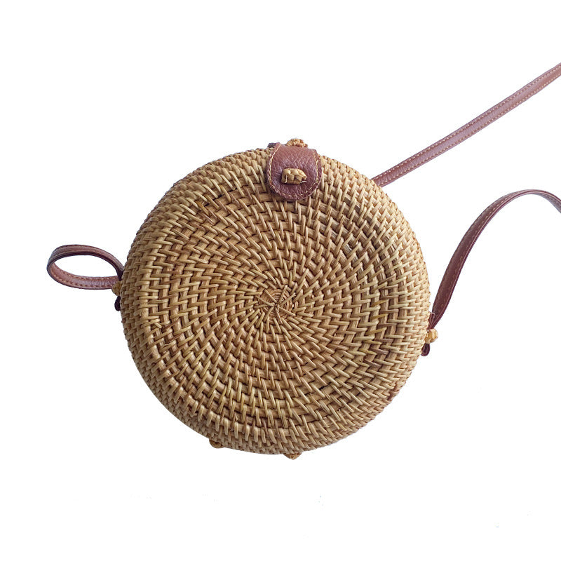 Women's round basket bag with unique ceramic detail Bowlift