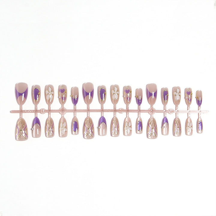 Artificial nail set with elegant flower and glitter details Bowlift