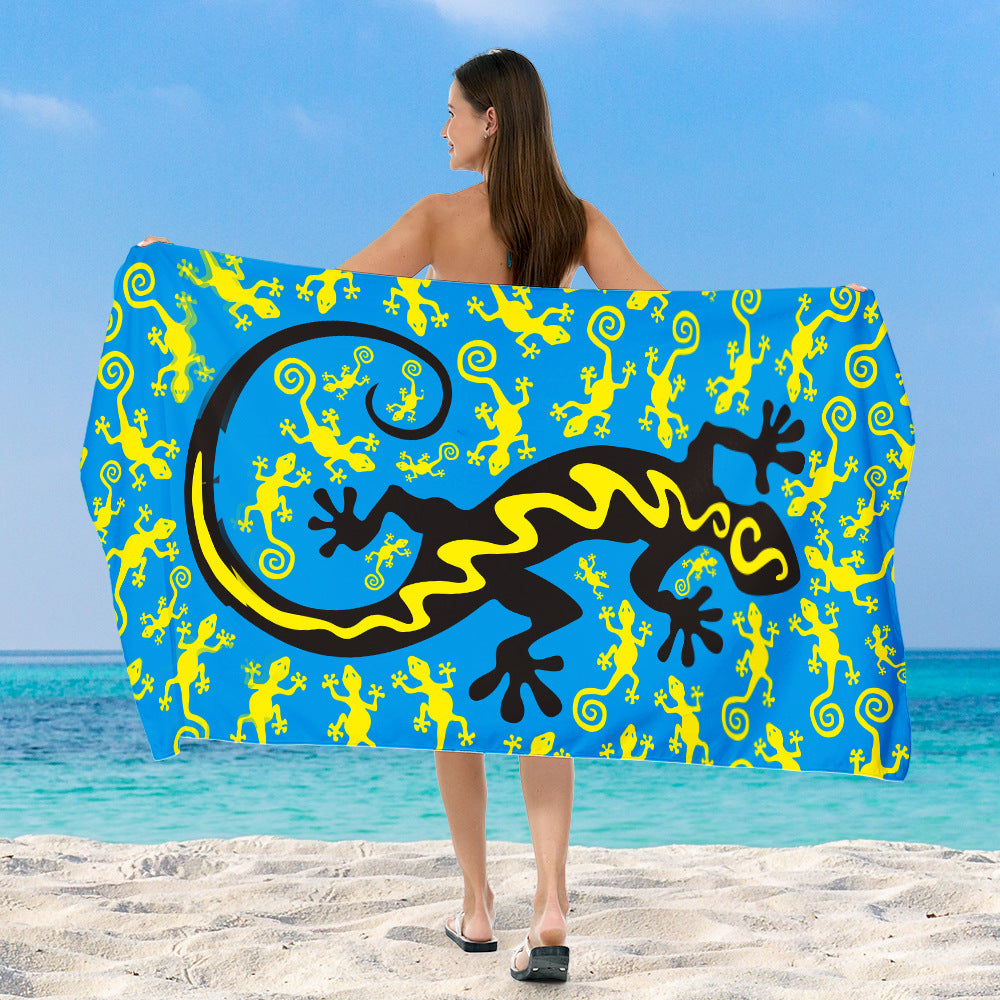 Beach towel with vibrant, colorful animal motif Bowlift