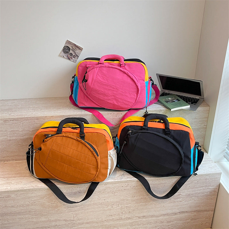 Sporty travel bag with multifunctional carrying options Bowlift