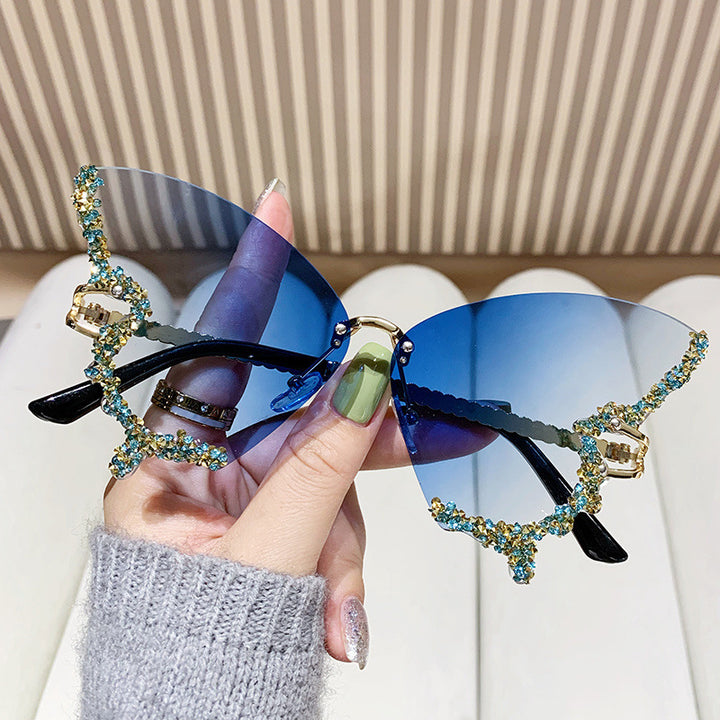 Women's extravagant sunglasses with sparkling butterfly design Bowlift