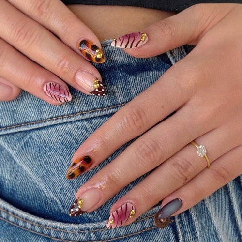 Artistic Press-On Nail Set with Unique Patterns and Embellishments Bowlift