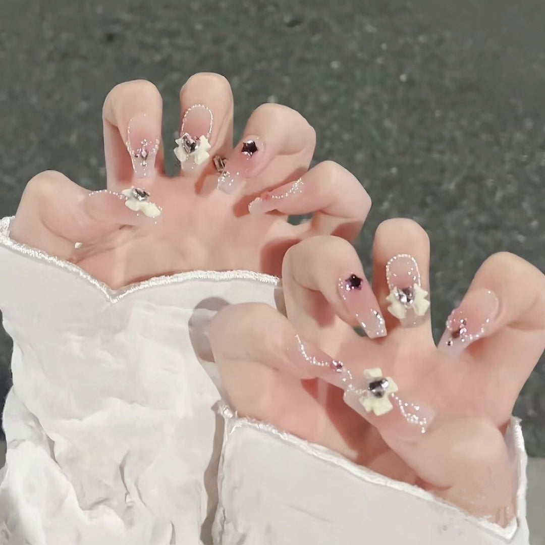 Artificial nails with floral accents Bowlift