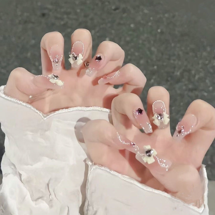 Artificial nails with floral accents Bowlift