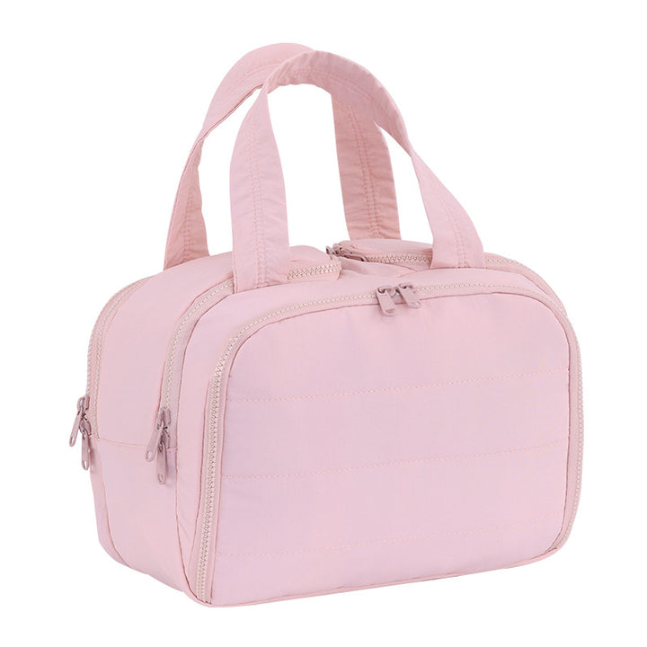 Travel bag with versatile interior pocket and practical carrying handle Bowlift